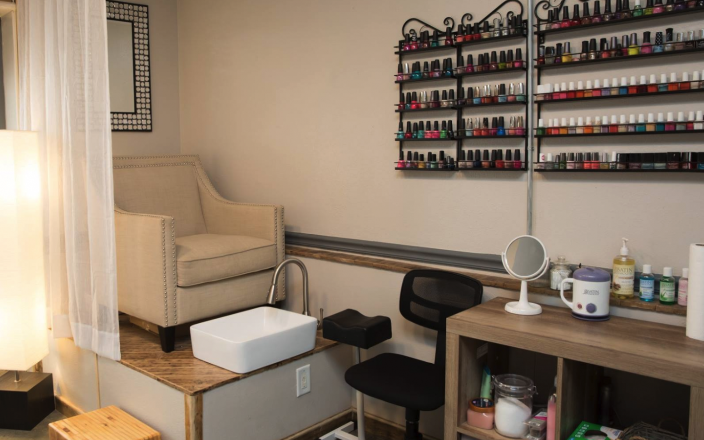 an elevated cushioned chair used for pedicures