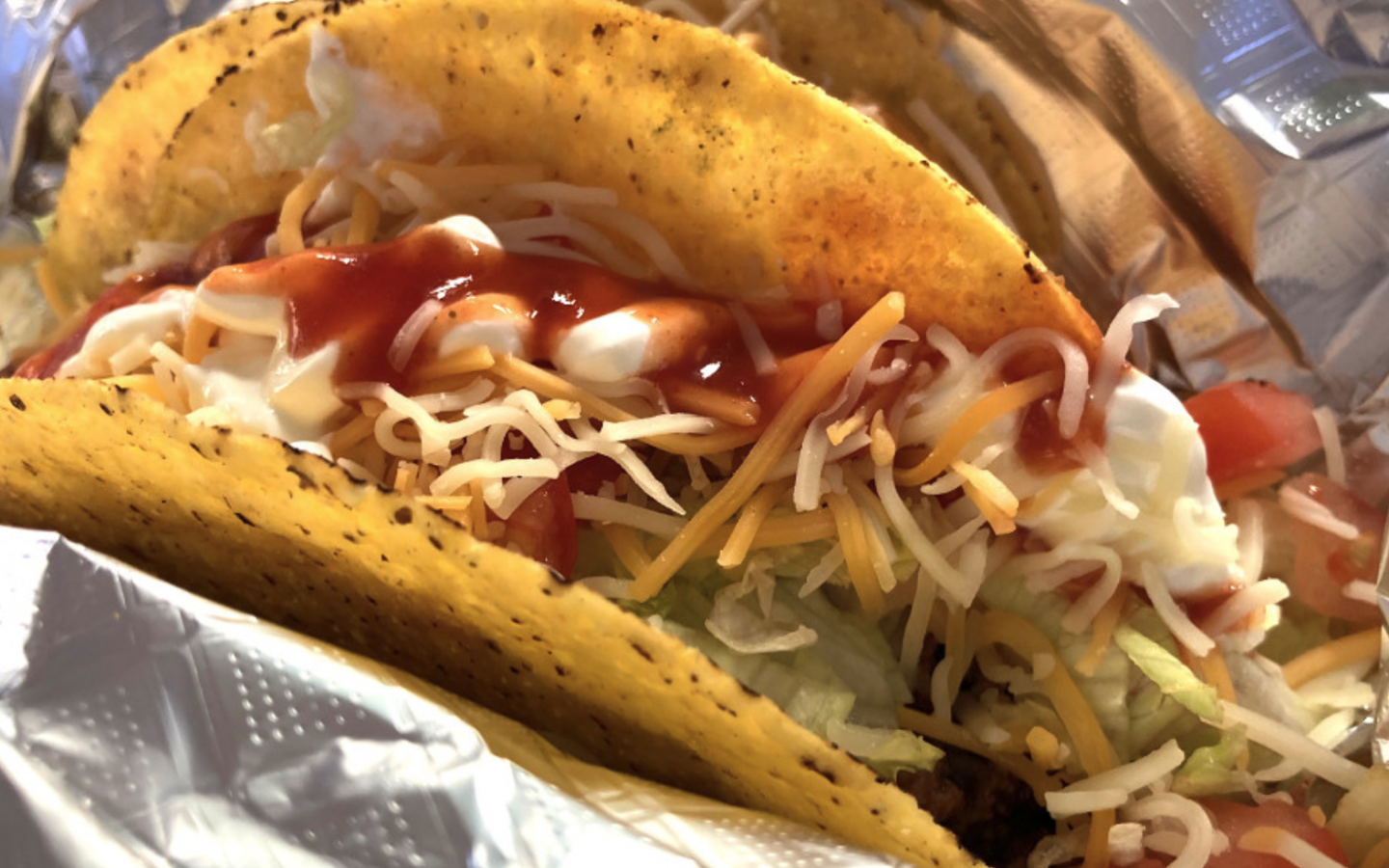 a taco topped with salsa