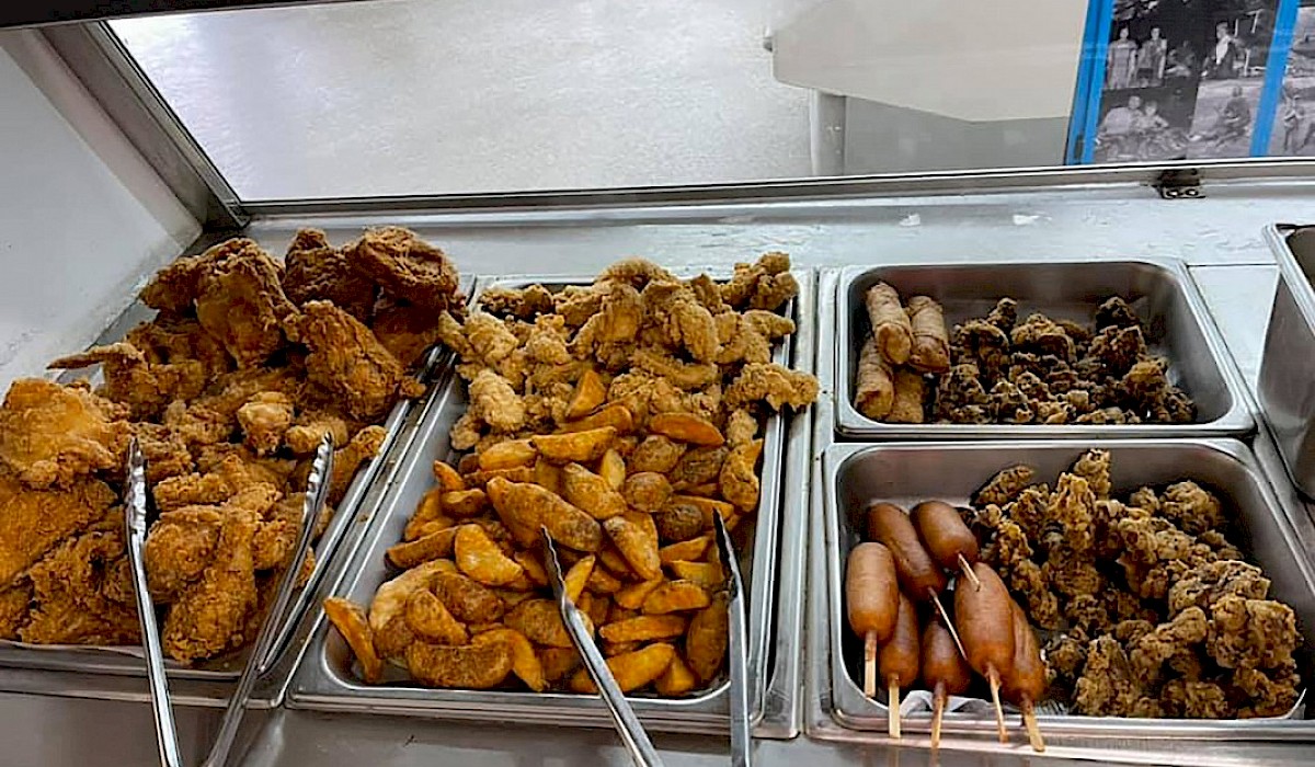 deli with fried chicken, tator logs, corn dogs and sides