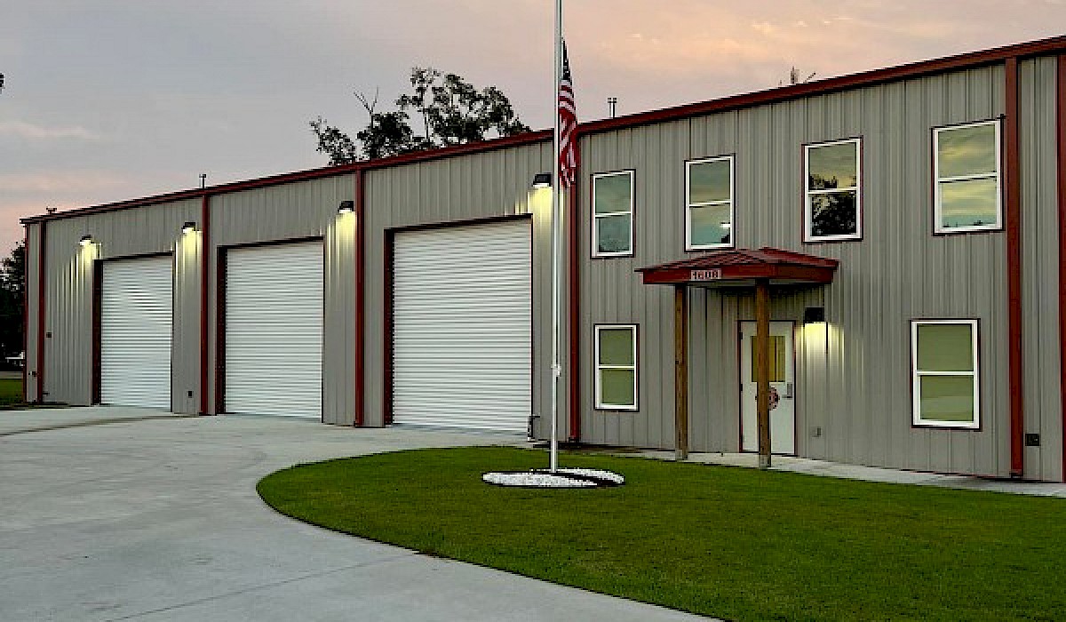 front of fire department building at day break